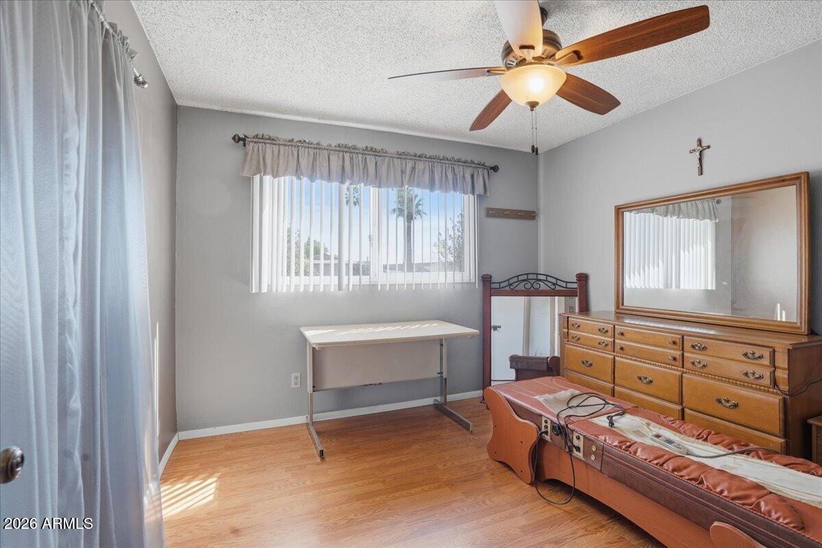 3922 South Poplar Street Tempe, AZ 85282 - Photo 31 of 41 a bedroom with furniture and a window