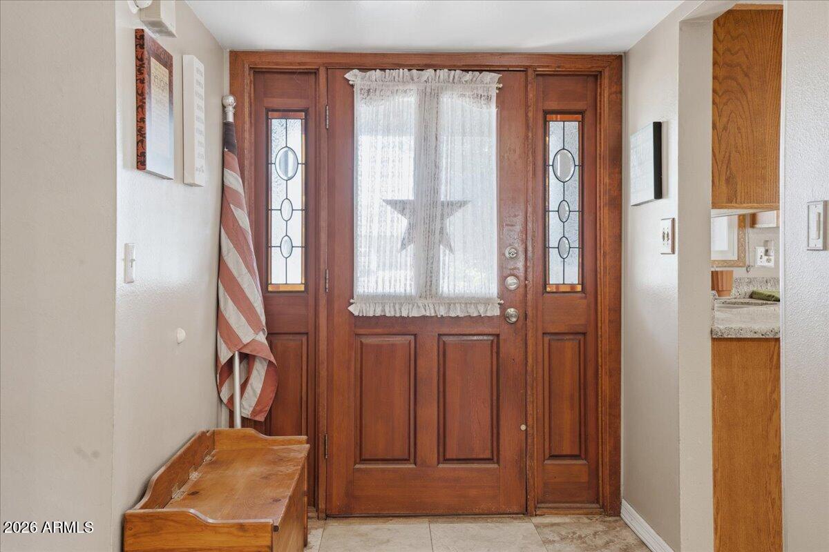 3922 South Poplar Street Tempe, AZ 85282 - Photo 4 of 41 a view of front door with furniture and a window