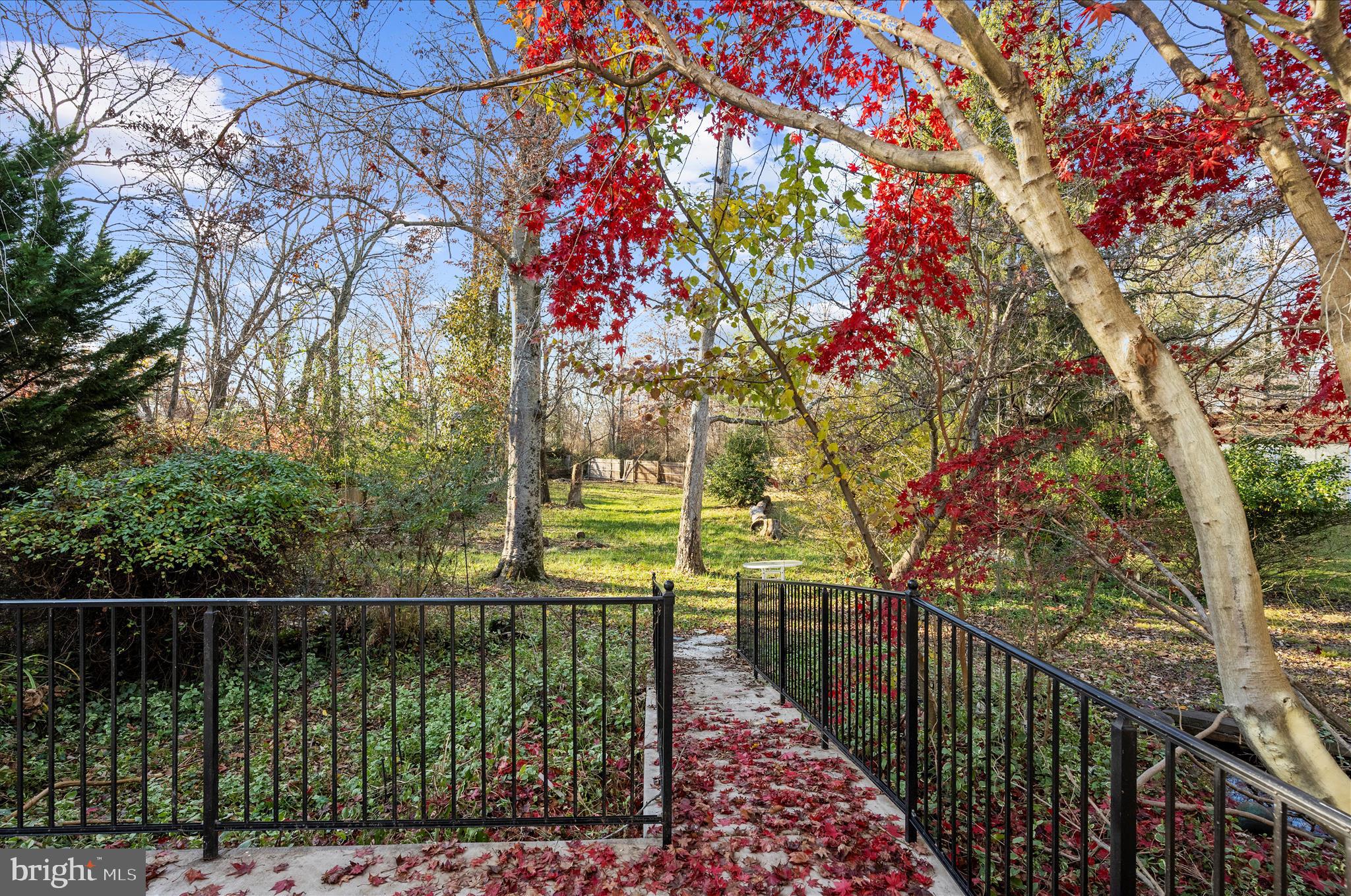 222 Doncaster Road Joppa, MD 21085 - Photo 33 of 41 a balcony with trees in front of it