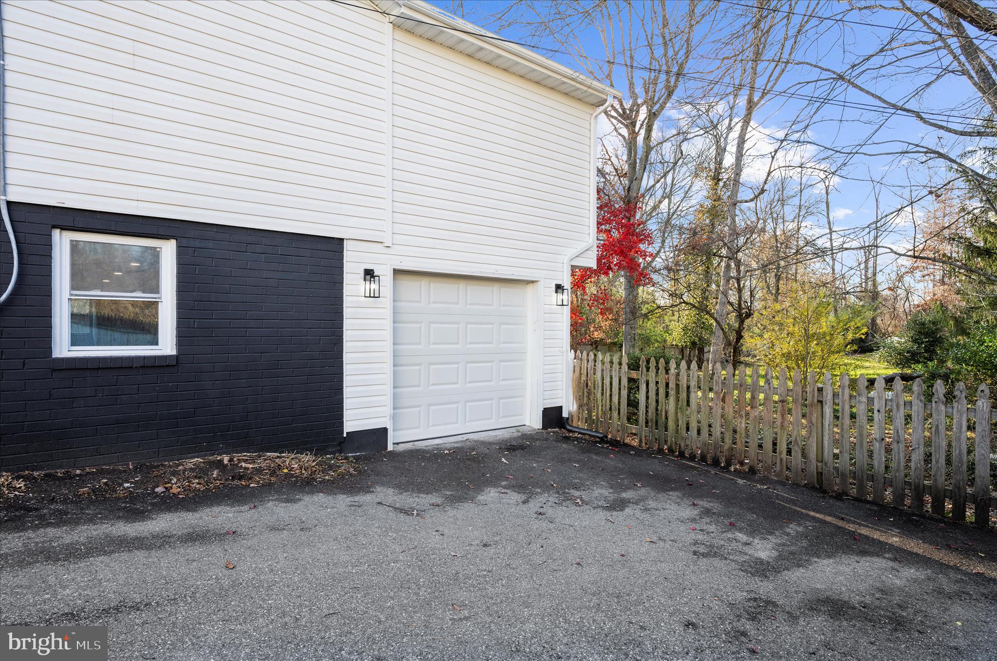 222 Doncaster Road Joppa, MD 21085 - Photo 37 of 41 a view of a house with a small yard and wooden fence