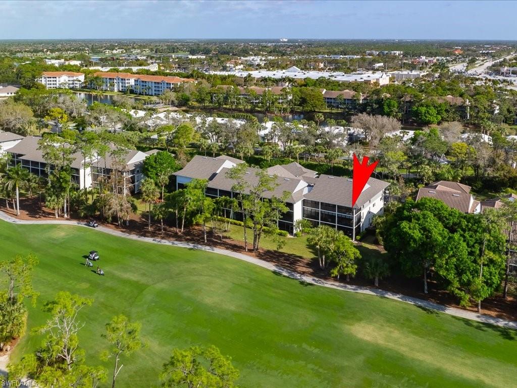 770 Eagle Creek Drive, Unit 301 Naples, FL 34113 - Photo 36 of 46 a view of a city
