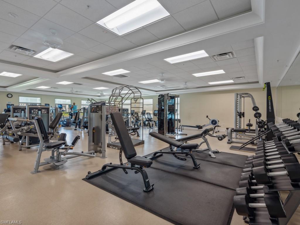 770 Eagle Creek Drive, Unit 301 Naples, FL 34113 - Photo 46 of 46 a view of a room with gym equipment