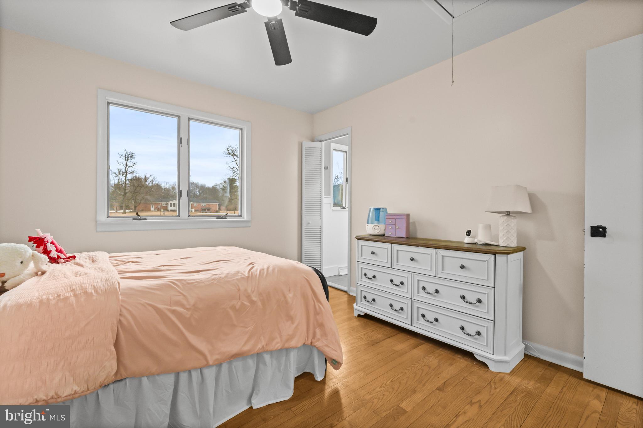 10514 Willetts Crossing Road White Plains, MD 20695 - Photo 25 of 41 a bedroom with a bed and a window