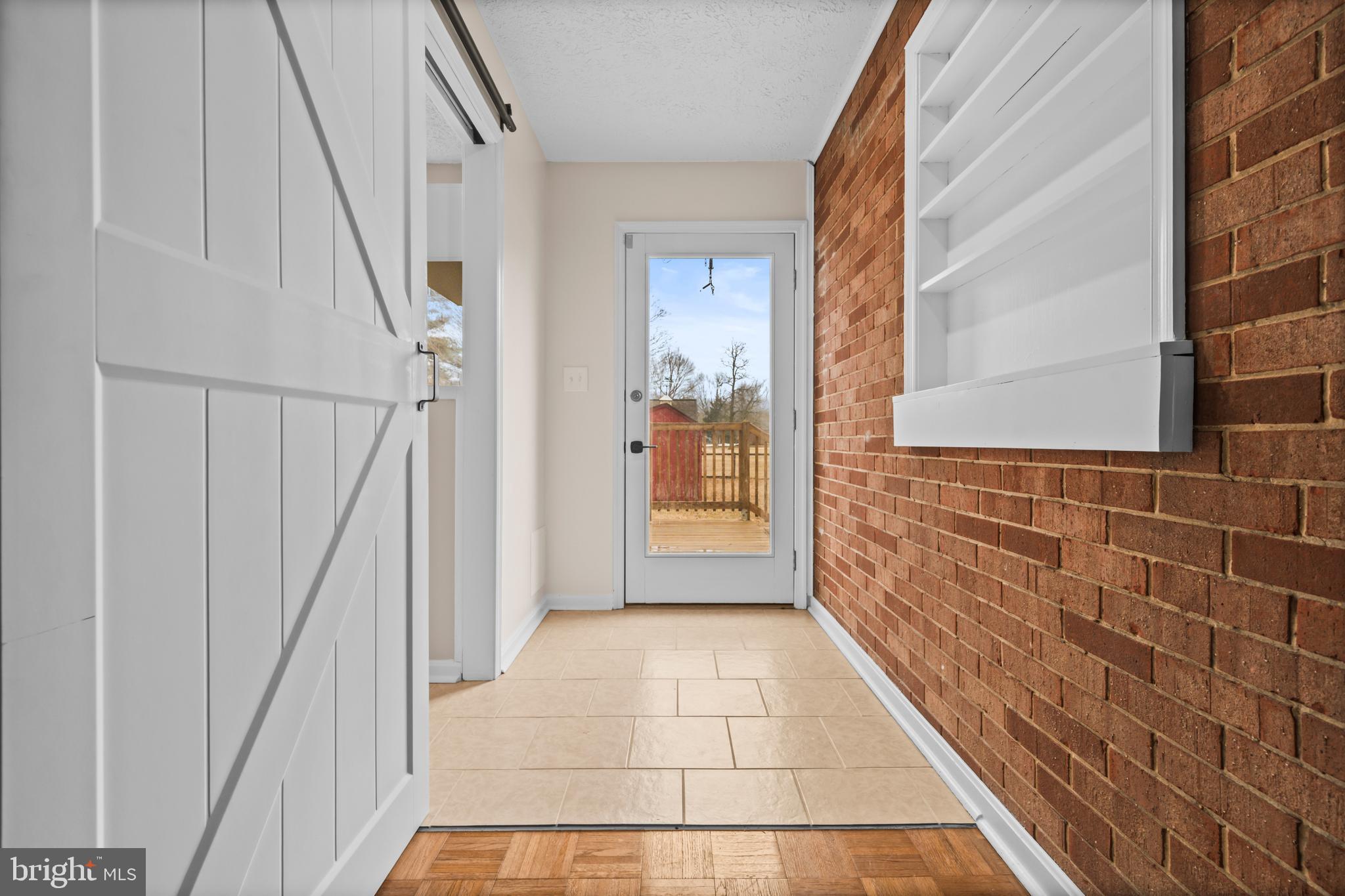 10514 Willetts Crossing Road White Plains, MD 20695 - Photo 26 of 41 a view of hallway with stairs