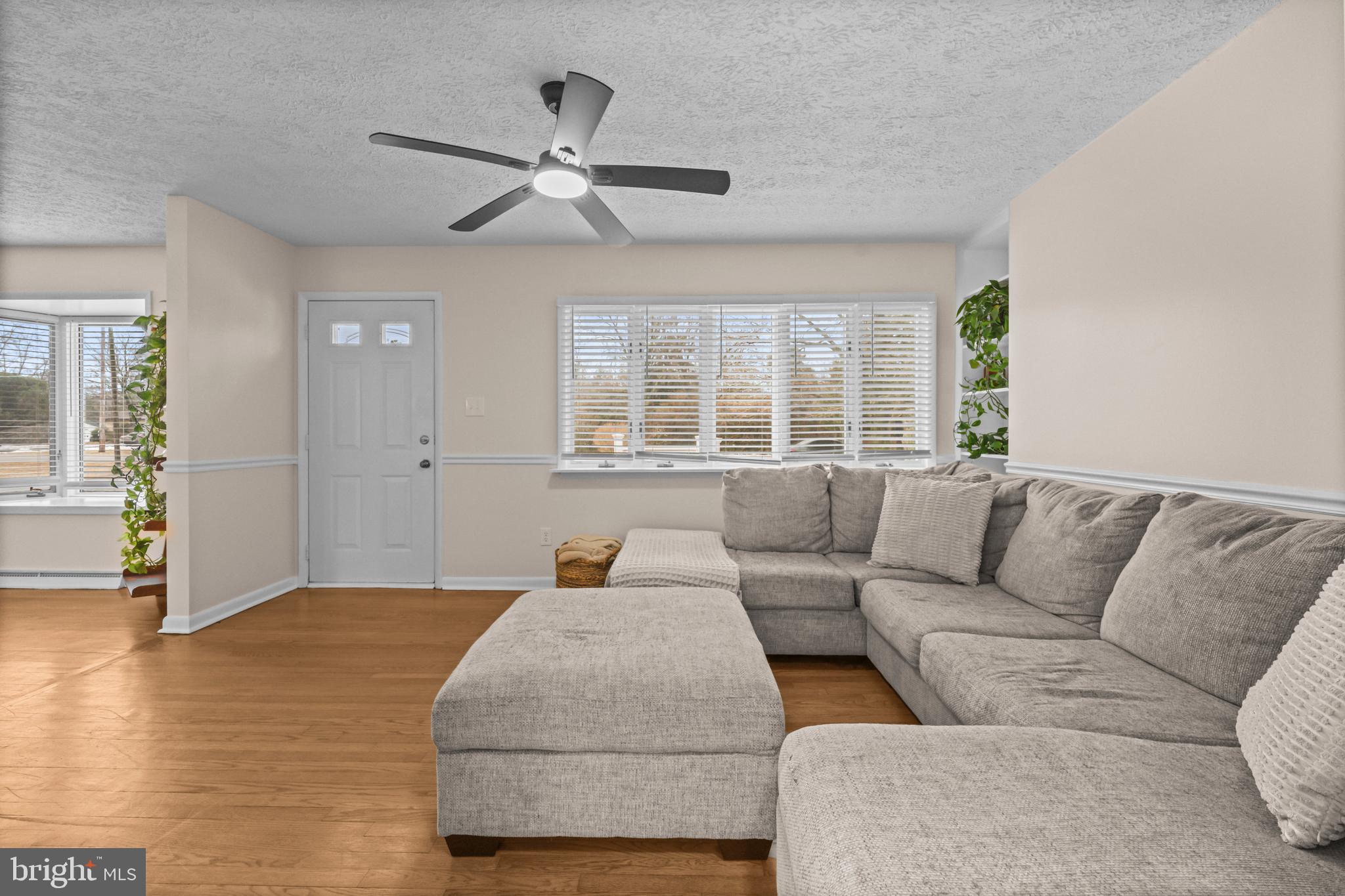 10514 Willetts Crossing Road White Plains, MD 20695 - Photo 3 of 41 a living room with furniture and a large window