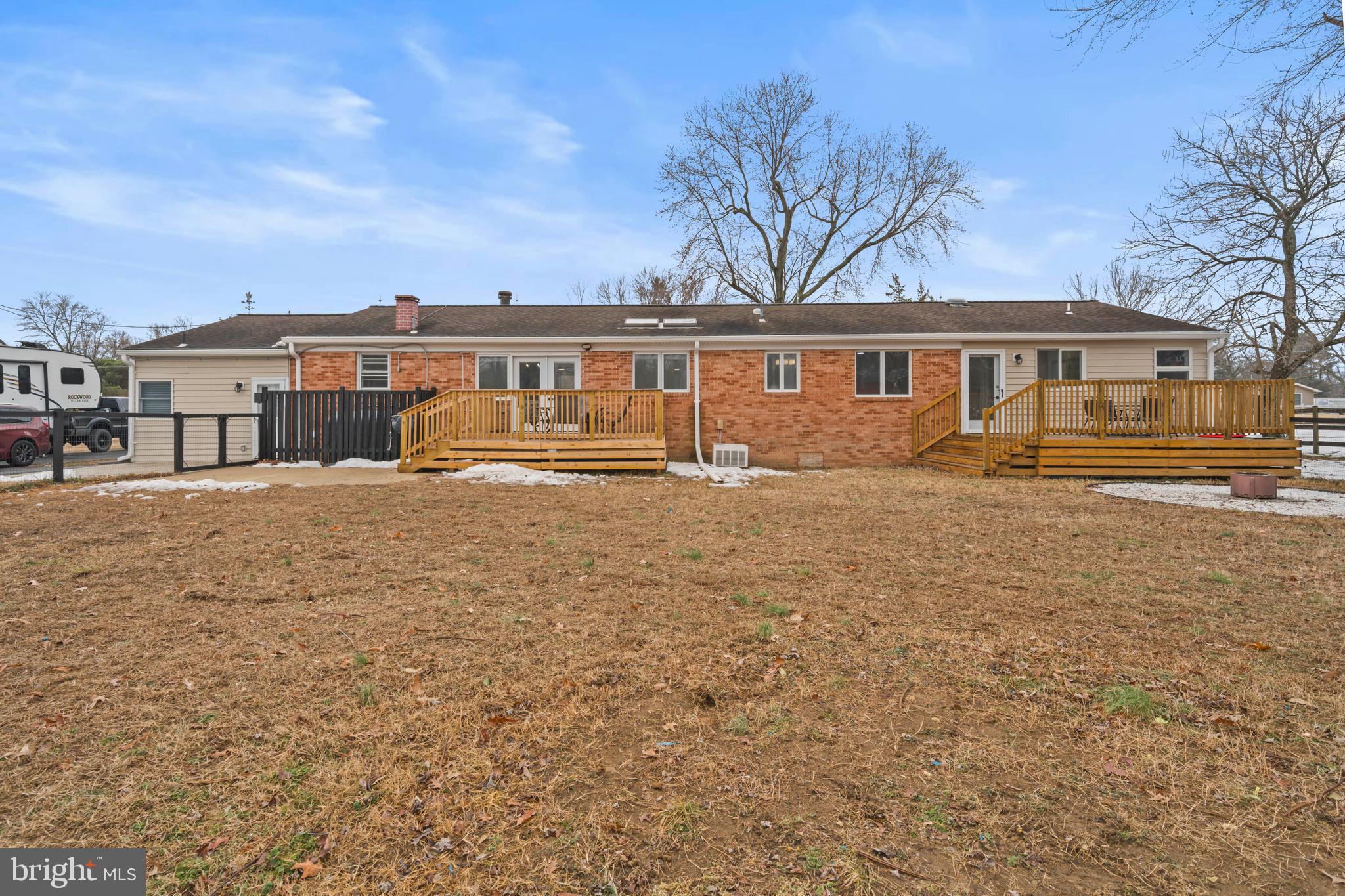 10514 Willetts Crossing Road White Plains, MD 20695 - Photo 37 of 41 front view of a house with a big yard