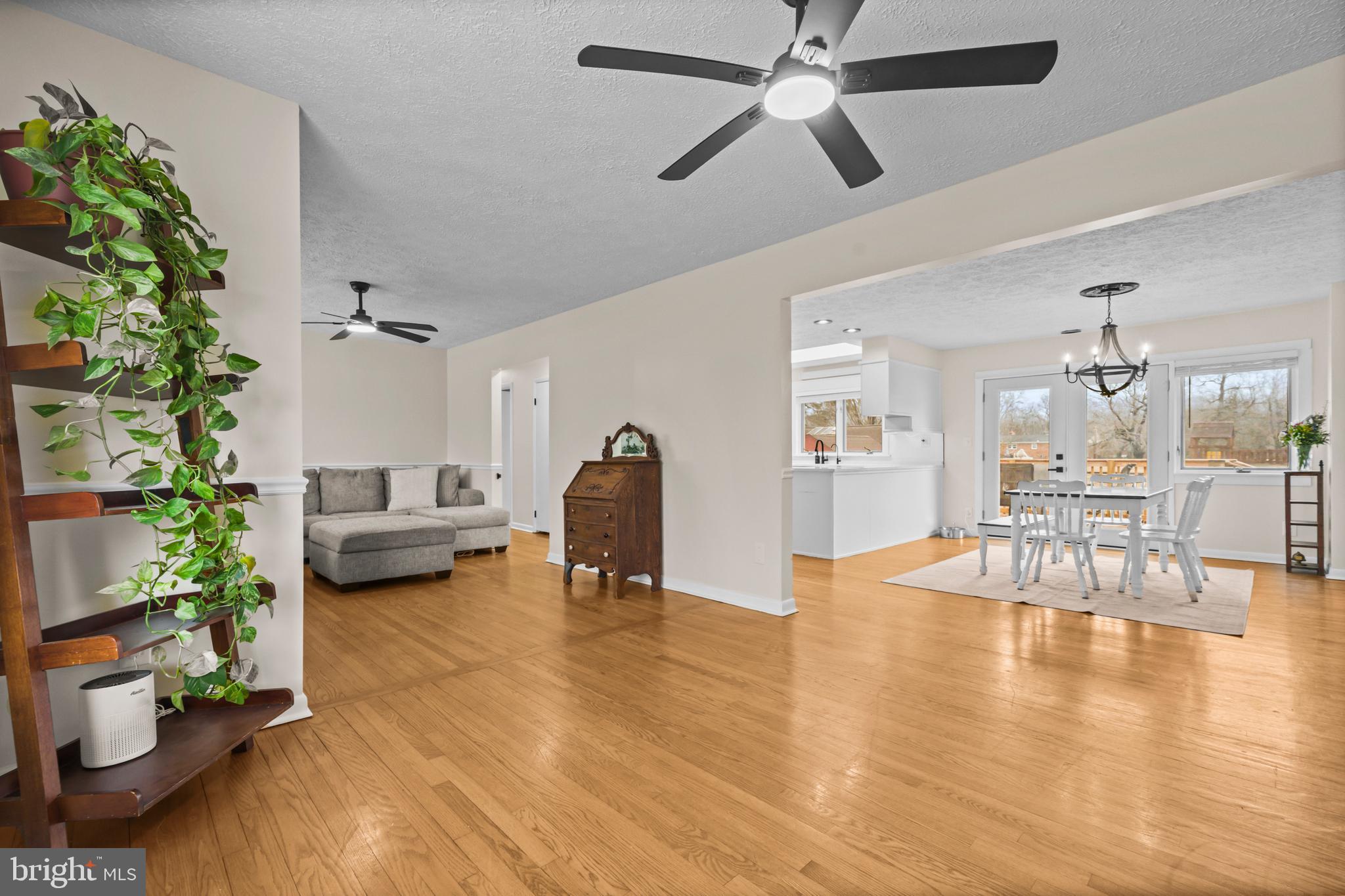 10514 Willetts Crossing Road White Plains, MD 20695 - Photo 5 of 41 a living room with furniture and a wooden floor