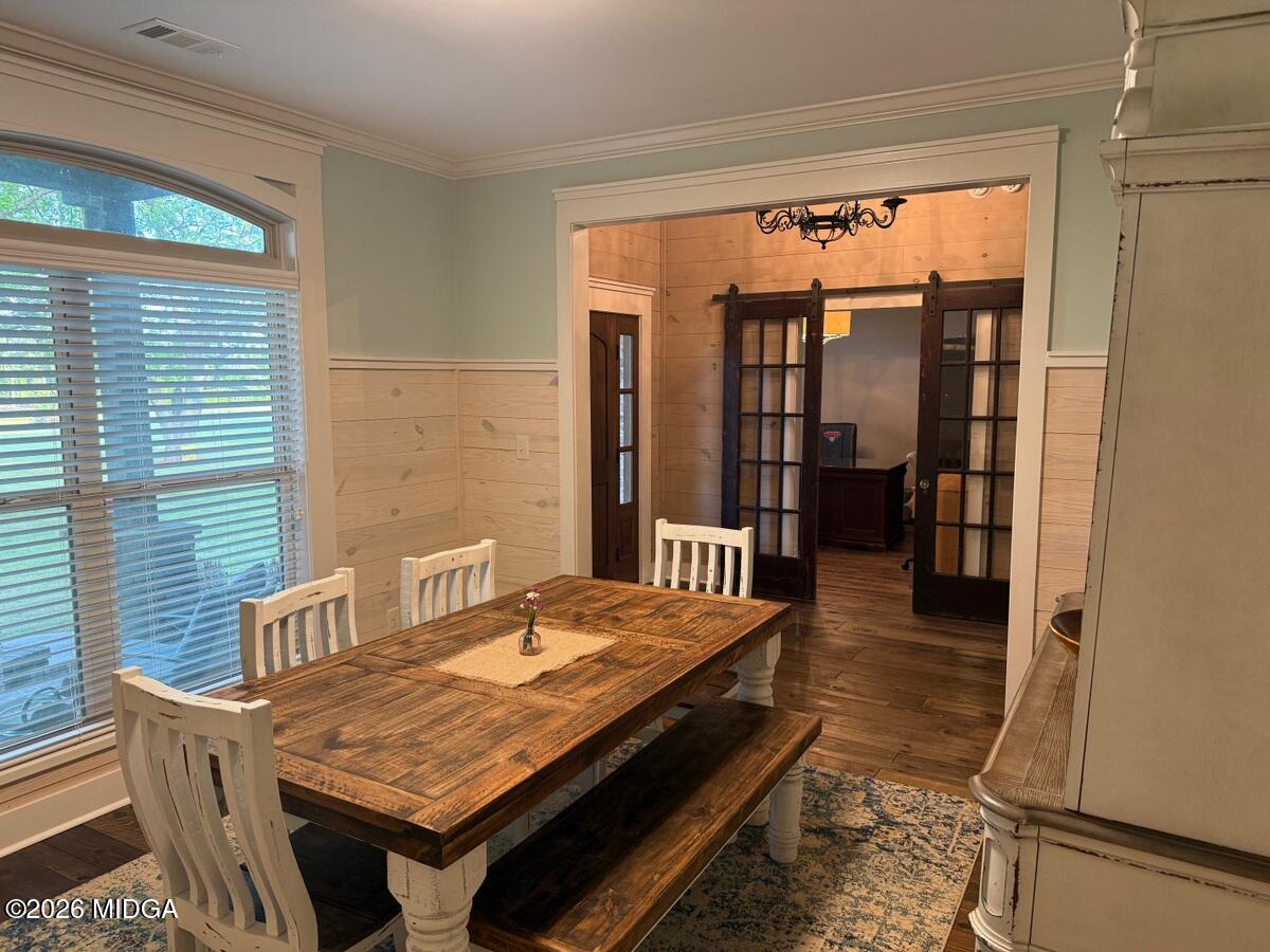 917 Broken Arrow Trail Perry, GA 31069 - Photo 13 of 34 a dining room with furniture and window