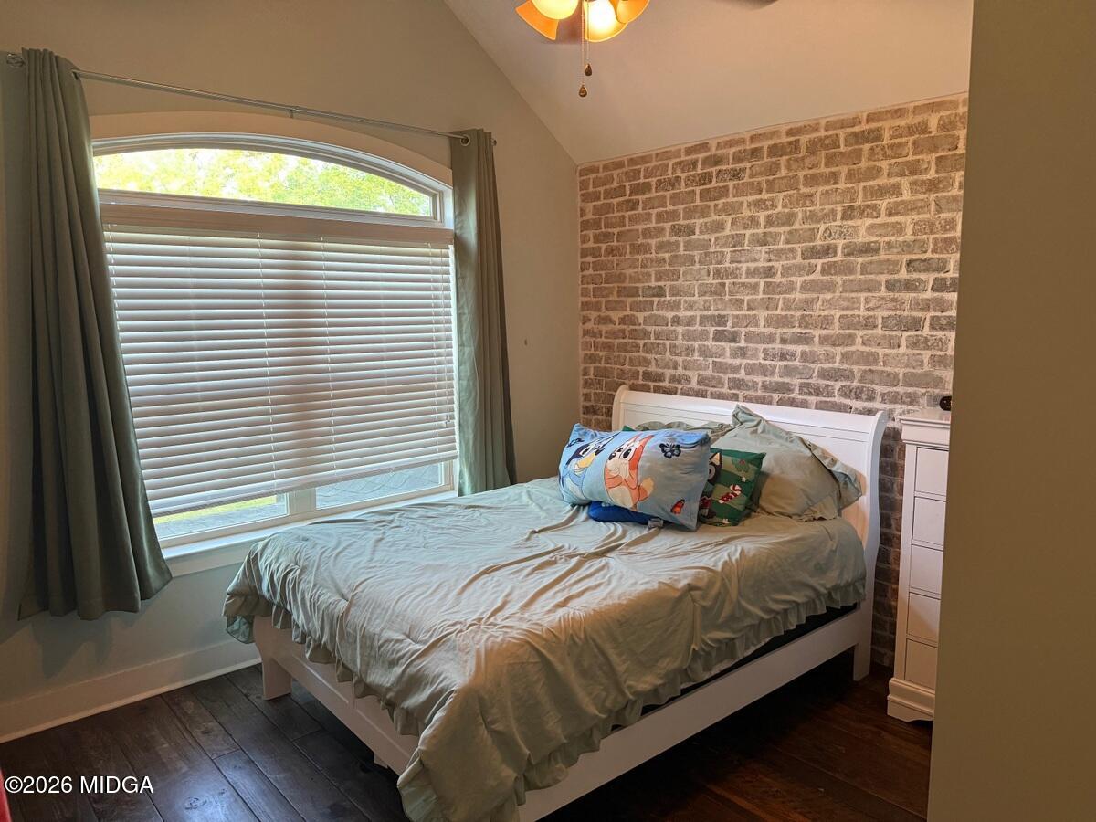 917 Broken Arrow Trail Perry, GA 31069 - Photo 28 of 34 a bedroom with a bed and a window