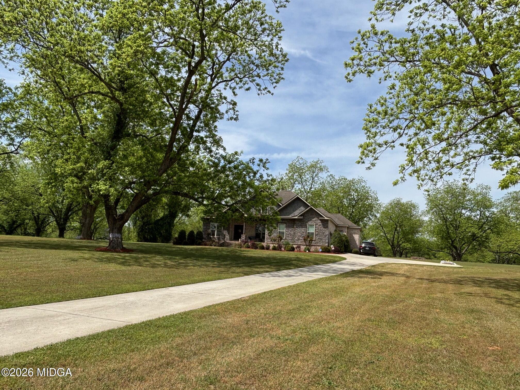 917 Broken Arrow Trail Perry, GA 31069 - Photo 4 of 34 a view of green field