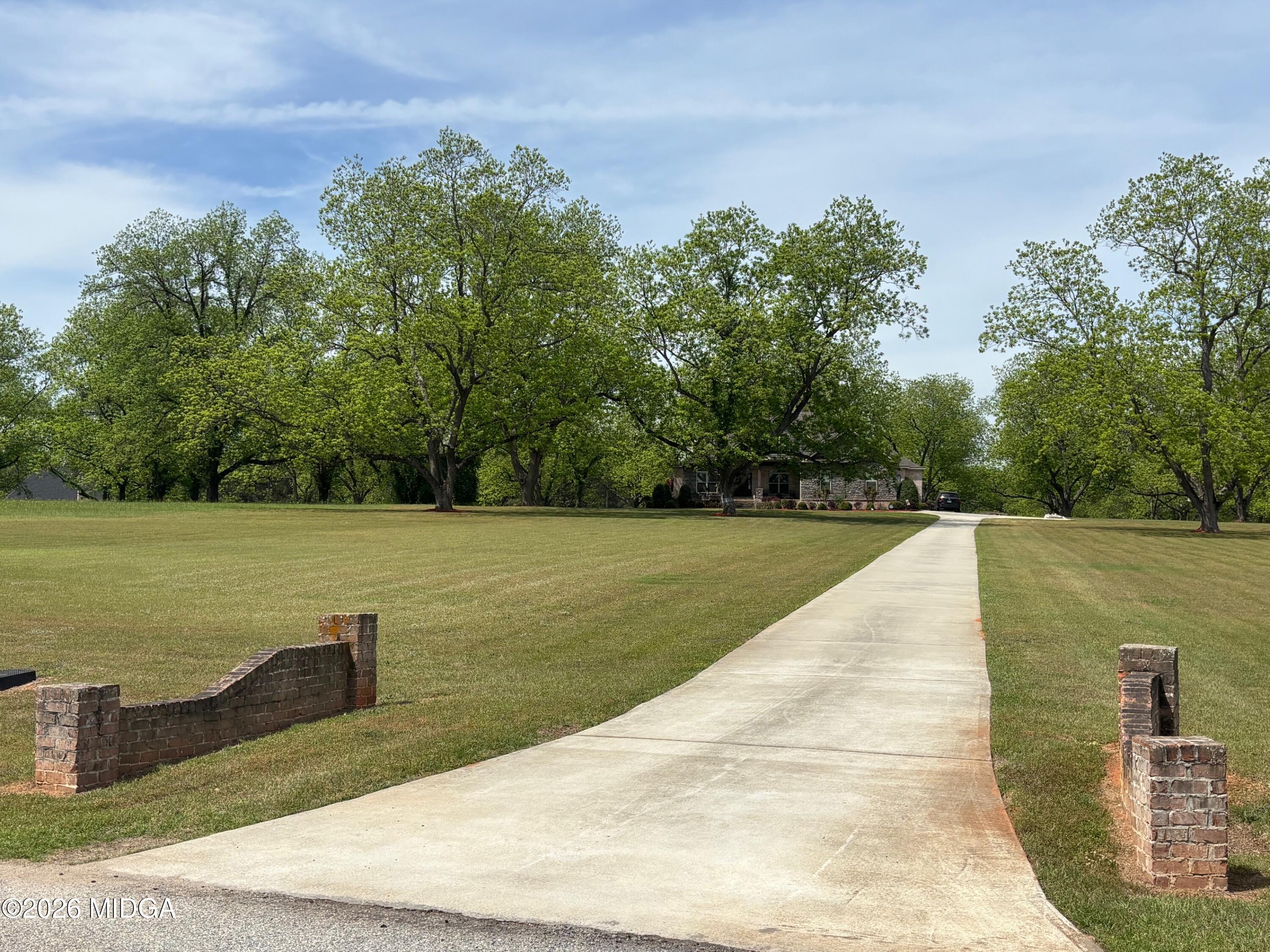 917 Broken Arrow Trail Perry, GA 31069 - Photo 6 of 34 a view of swimming pool with a yard