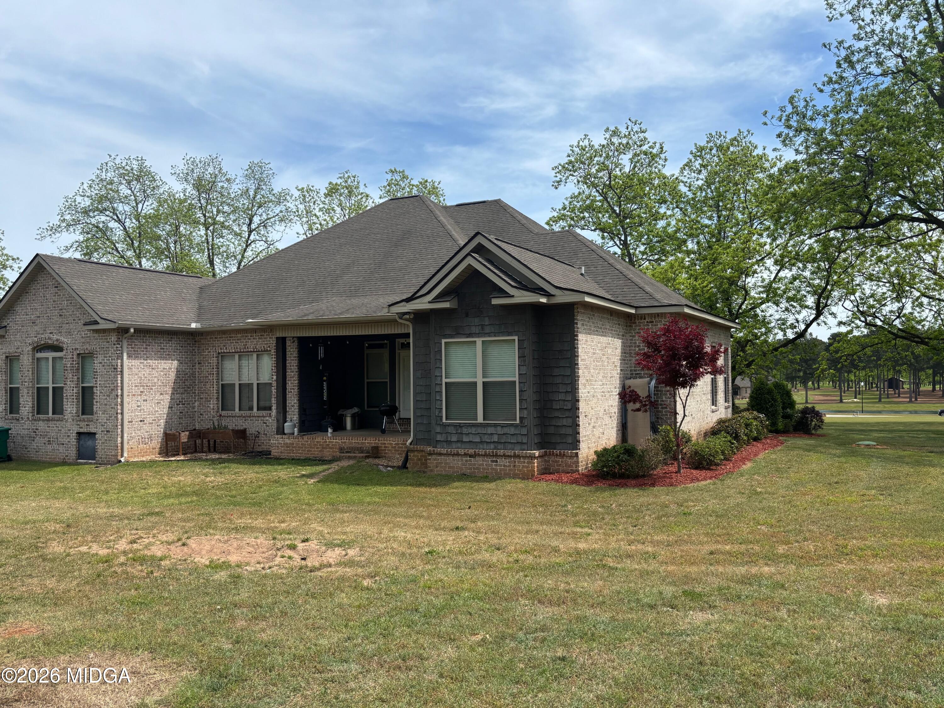 917 Broken Arrow Trail Perry, GA 31069 - Photo 8 of 34 a view of a house with a yard