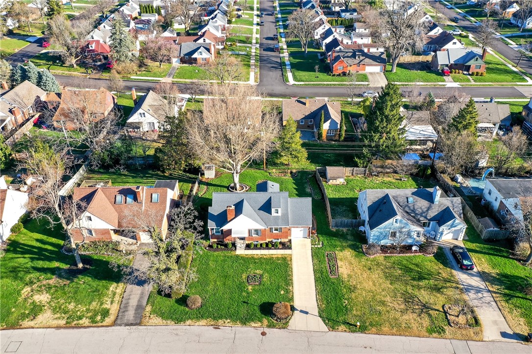 1237 Laurelwood Road Dayton, OH 45409 - Photo 48 of 56 An aerial perspective reveals a well-maintained neighborhood with charming homes and lush green lawns.