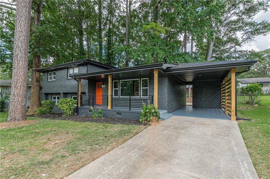 front view of a house with a yard