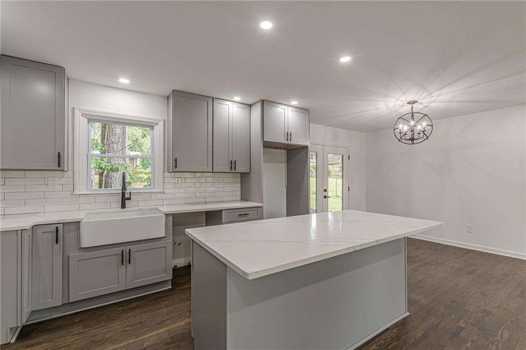 2352 Glendale Drive Decatur, GA 30032 - Photo 11 of 39 a kitchen with a stove a sink and a refrigerator