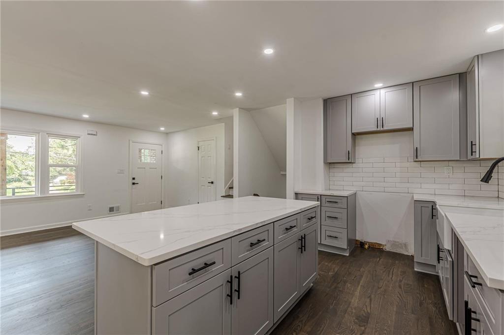 2352 Glendale Drive Decatur, GA 30032 - Photo 13 of 39 a view of a kitchen with center island and wooden floor