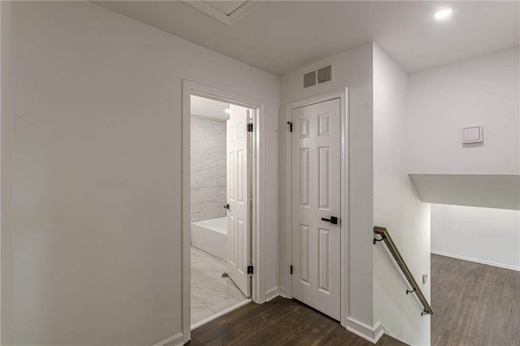 2352 Glendale Drive Decatur, GA 30032 - Photo 16 of 39 a view of a hallway with wooden floor