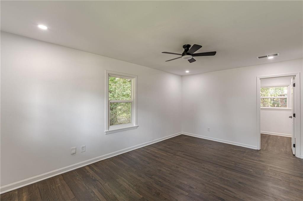 2352 Glendale Drive Decatur, GA 30032 - Photo 21 of 39 wooden floor in an empty room with a window