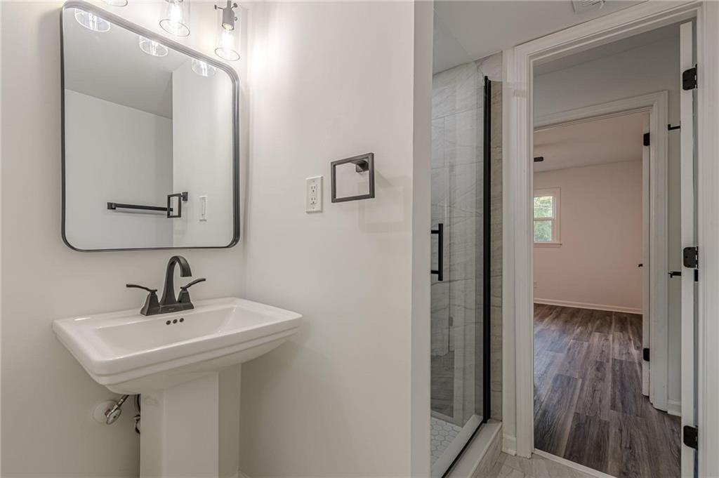 2352 Glendale Drive Decatur, GA 30032 - Photo 34 of 39 a bathroom with a sink and a mirror