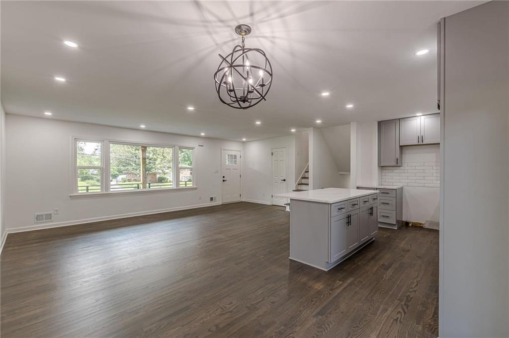 2352 Glendale Drive Decatur, GA 30032 - Photo 8 of 39 an open kitchen with a stove and a large window