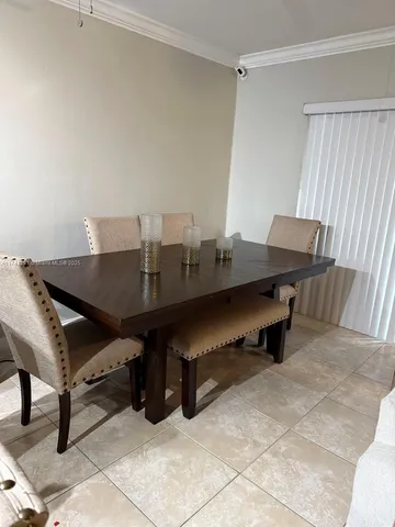 a view of a workspace with furniture