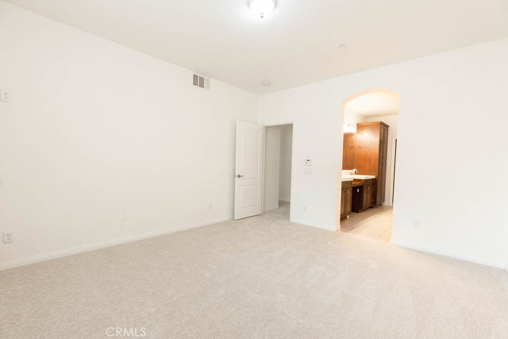 40 Tea Garden Irvine, CA 92620 - Photo 14 of 27 a view of a livingroom with a stove