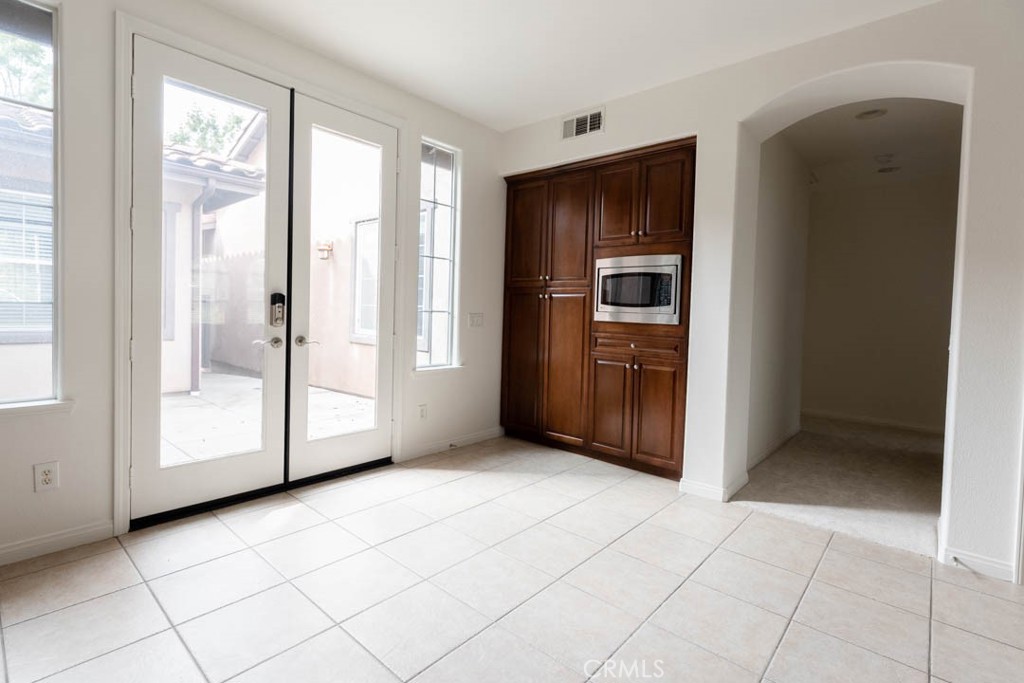 40 Tea Garden Irvine, CA 92620 - Photo 6 of 27 an empty room with windows and closet