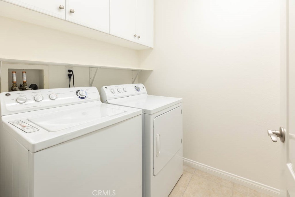 40 Tea Garden Irvine, CA 92620 - Photo 10 of 27 a utility room with dryer and washer