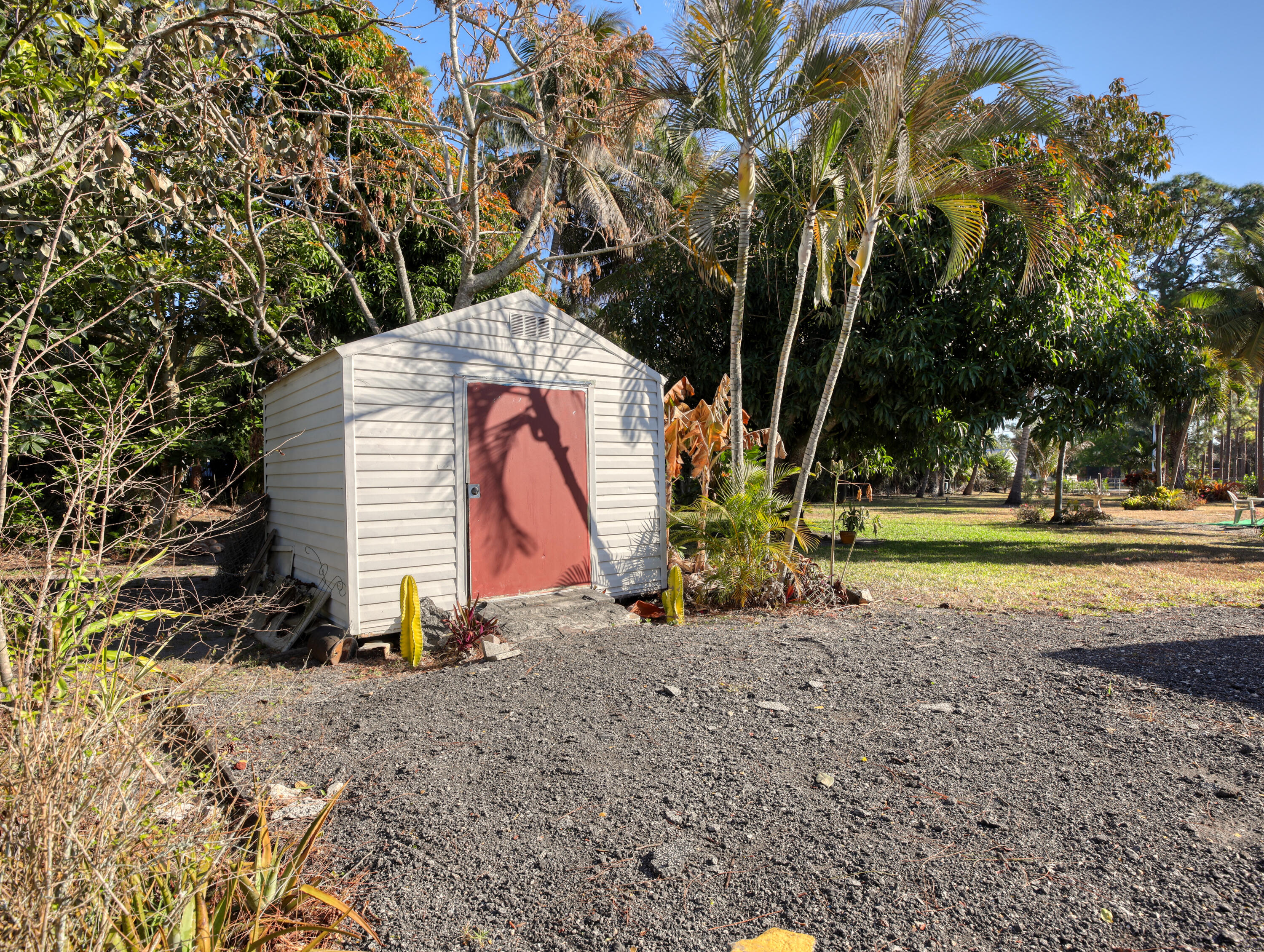 15049 85th Road North The Acreage, FL 33470 - Photo 15 of 60 a view of a park with swings