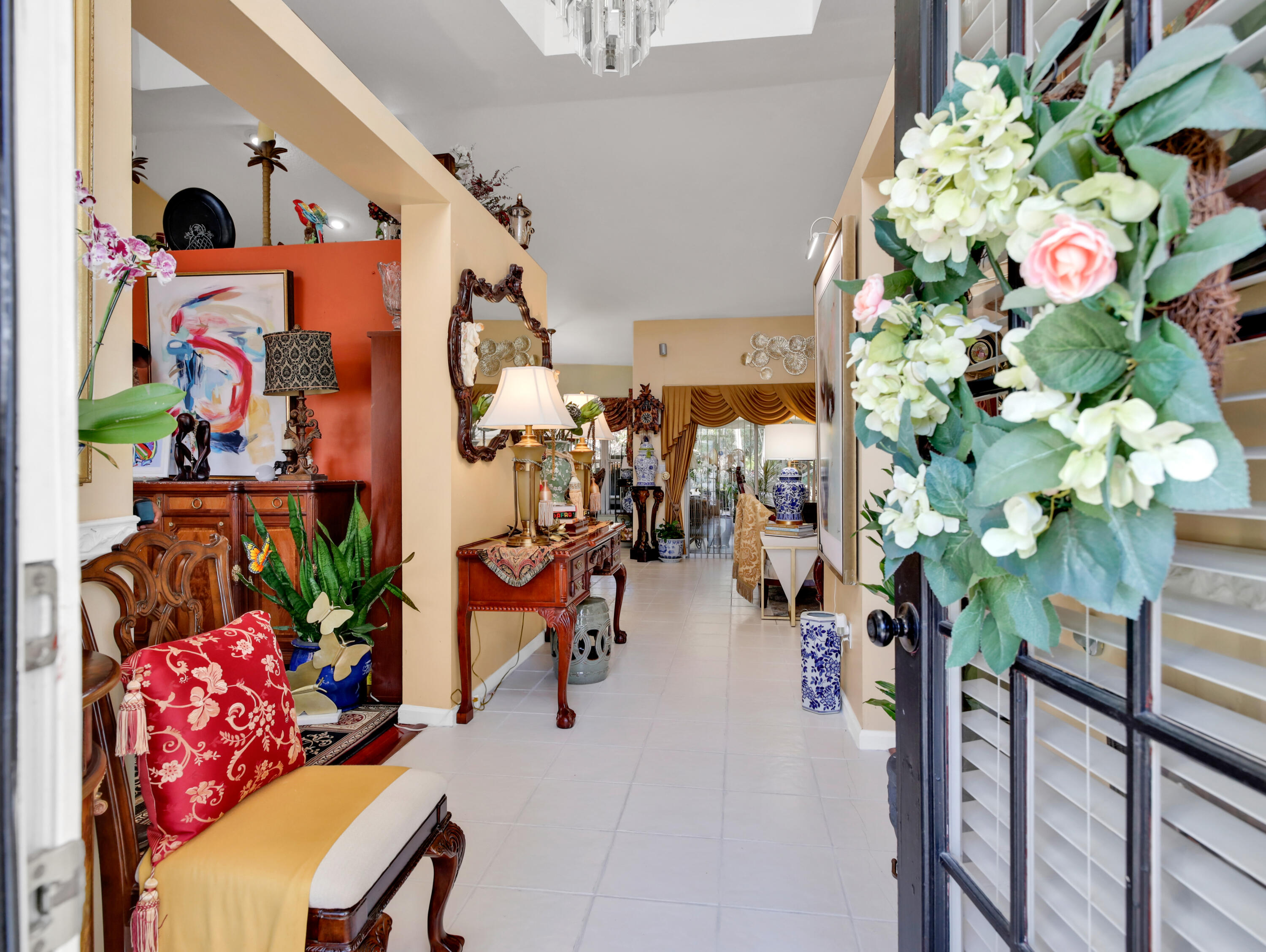 15049 85th Road North The Acreage, FL 33470 - Photo 20 of 60 a vase of flowers sitting on a table