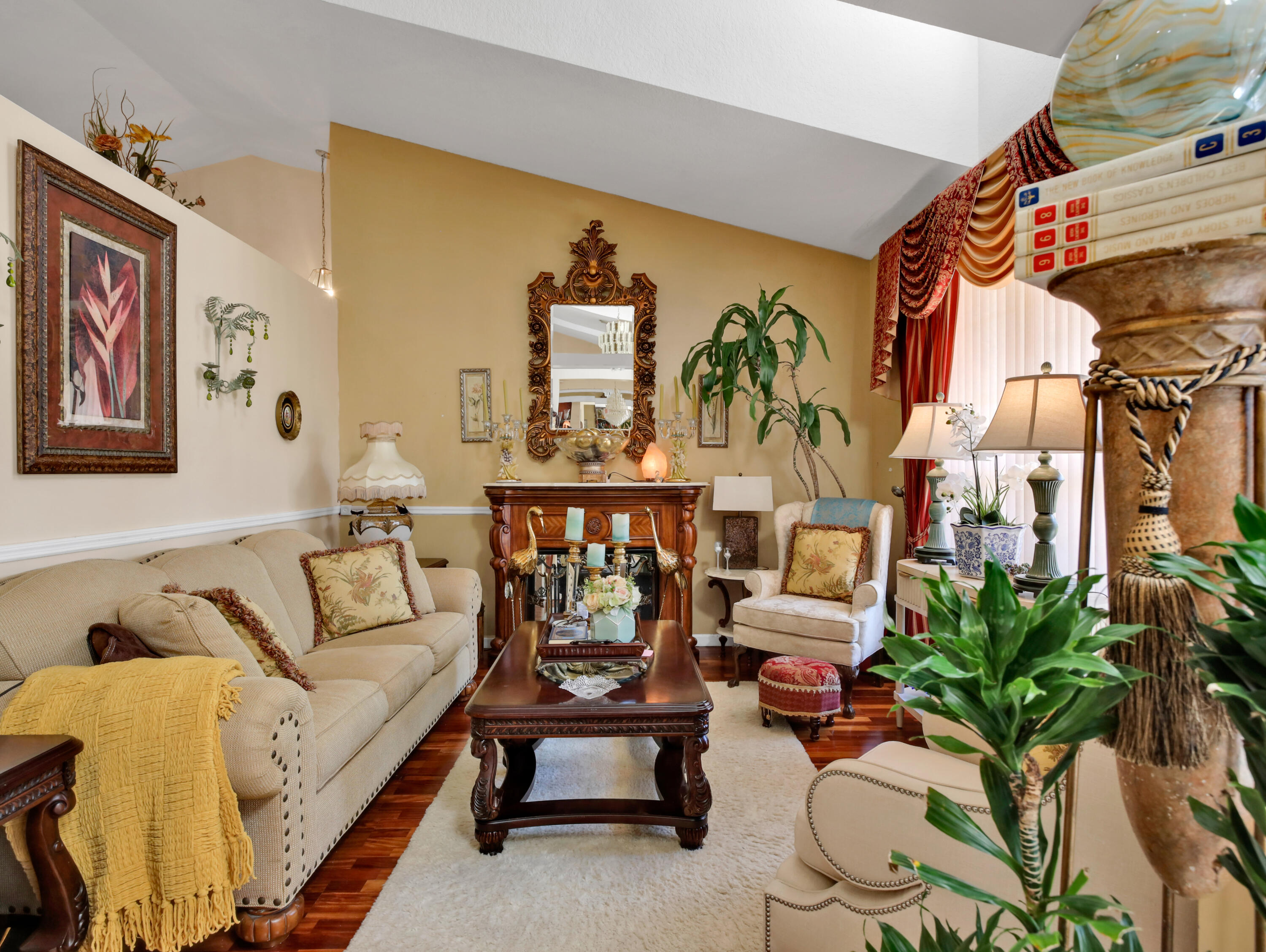15049 85th Road North The Acreage, FL 33470 - Photo 22 of 60 a living room with patio furniture and a potted plant