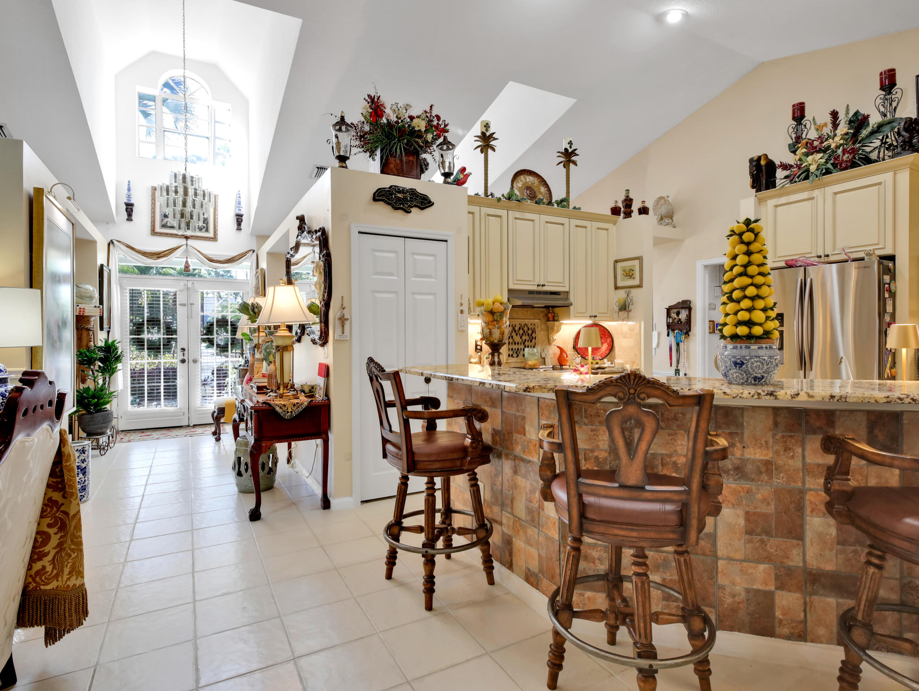 15049 85th Road North The Acreage, FL 33470 - Photo 28 of 60 a view of a dining room with furniture and chandelier