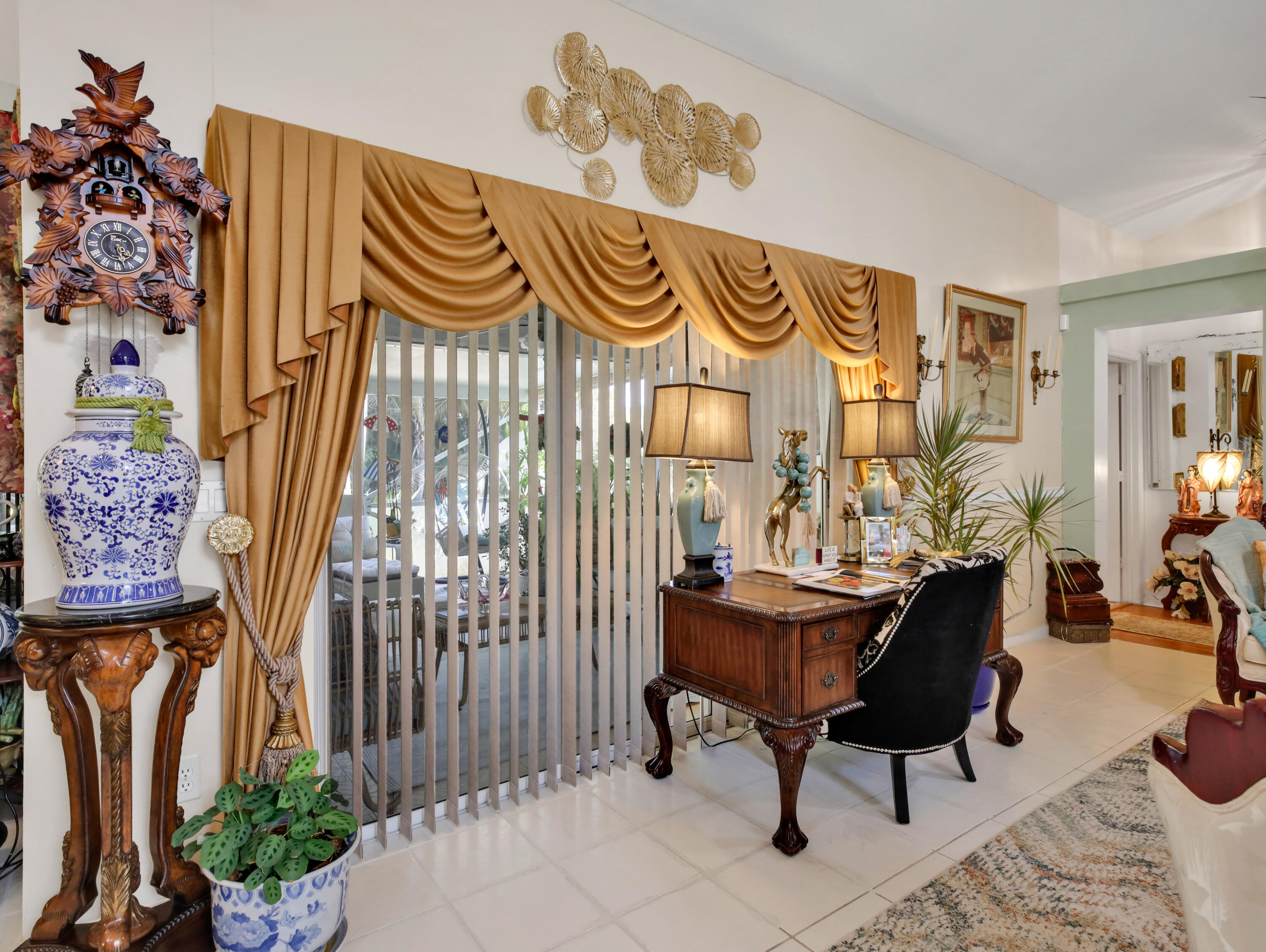 15049 85th Road North The Acreage, FL 33470 - Photo 29 of 60 a view of a room with furniture and a potted plant