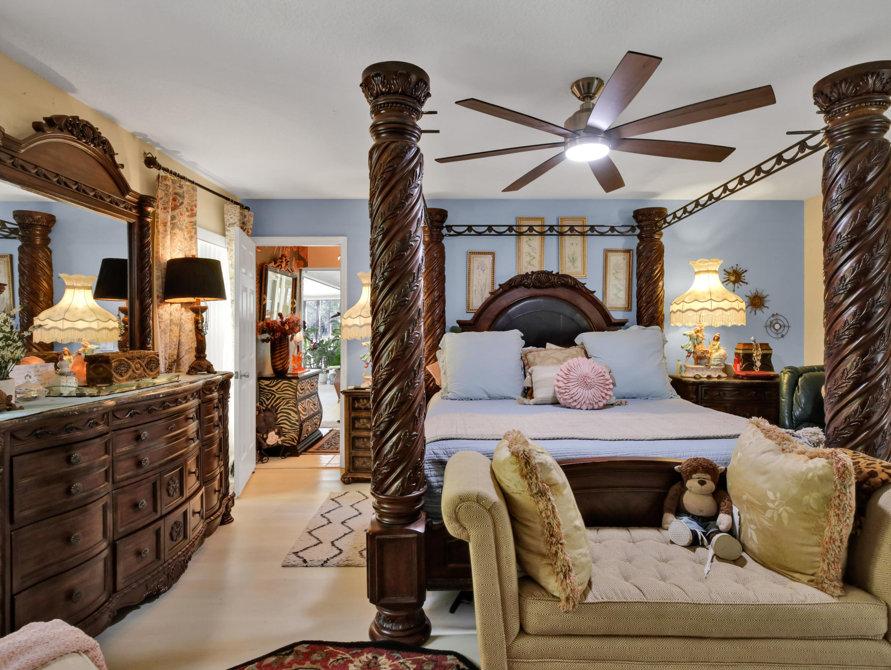 15049 85th Road North The Acreage, FL 33470 - Photo 41 of 60 a bedroom with a bed and ceiling fan