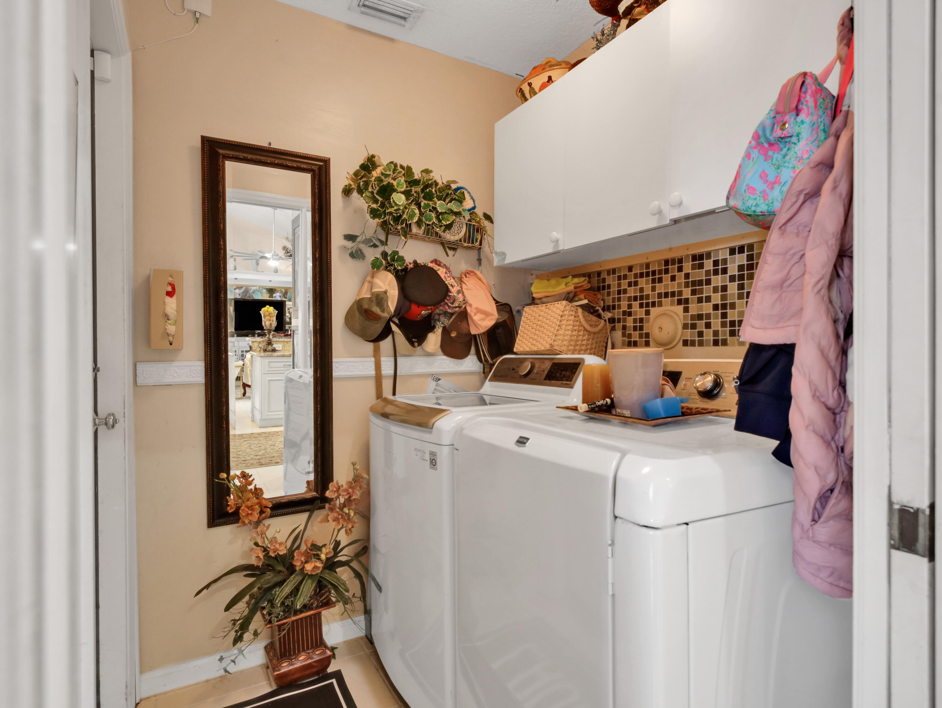 15049 85th Road North The Acreage, FL 33470 - Photo 48 of 60 a utility room with dryer and washer