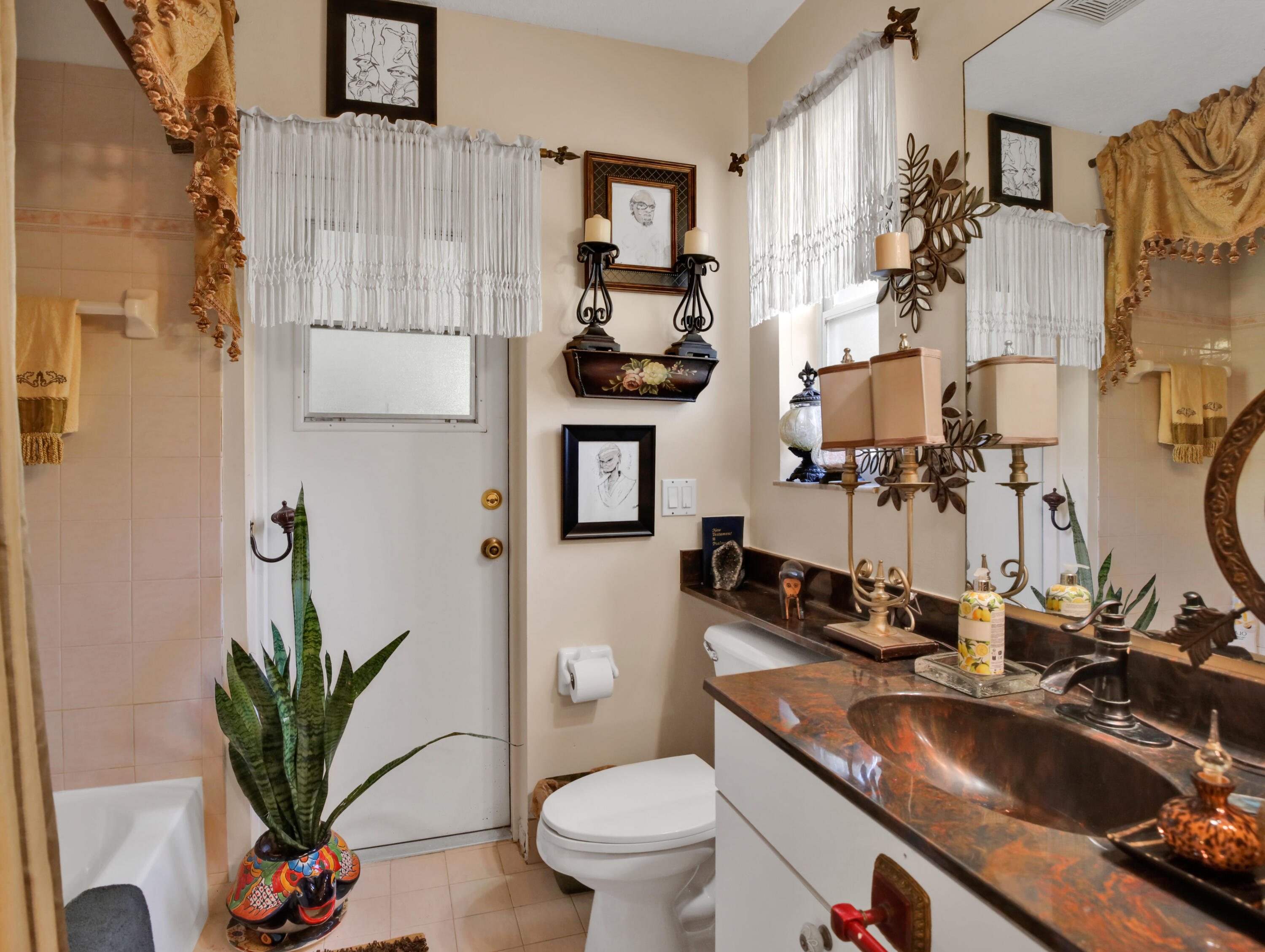 15049 85th Road North The Acreage, FL 33470 - Photo 51 of 60 a bathroom with a sink a toilet and a mirror