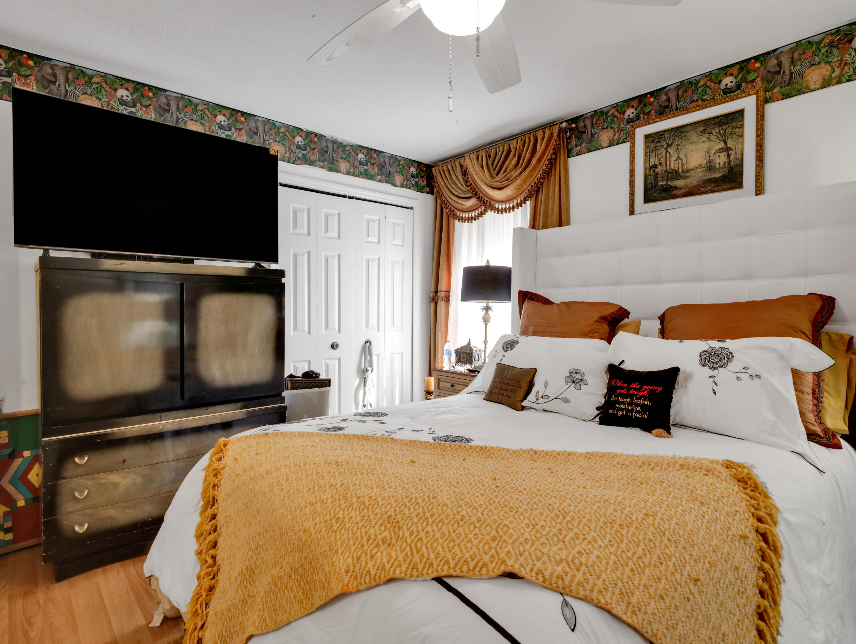 15049 85th Road North The Acreage, FL 33470 - Photo 56 of 60 a bedroom with bed and flat screen tv