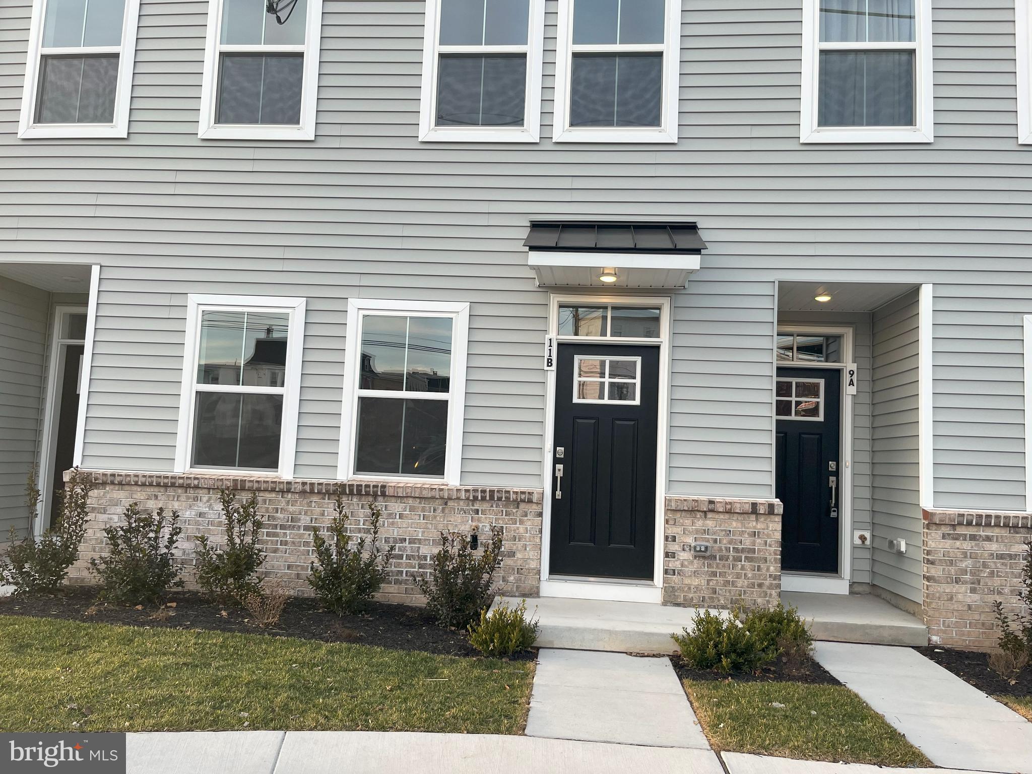 8 East Front Street Bridgeport, PA 19405 - Photo 2 of 38 a front view of a house with a yard