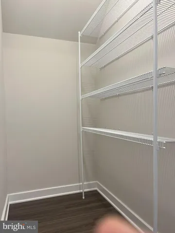a view of an empty walk in closet