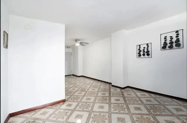 a view of a bedroom with a bench