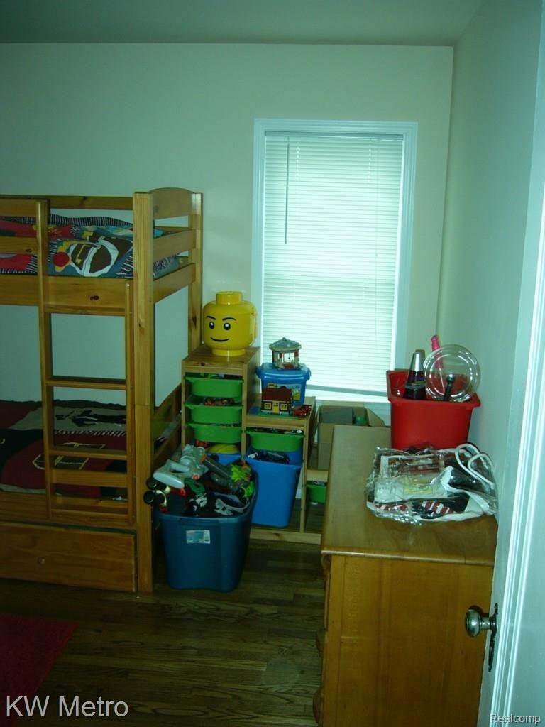 2379 Cambridge Road Berkley, MI 48072 - Photo 9 of 17 first floor bedroom with hardwood floors