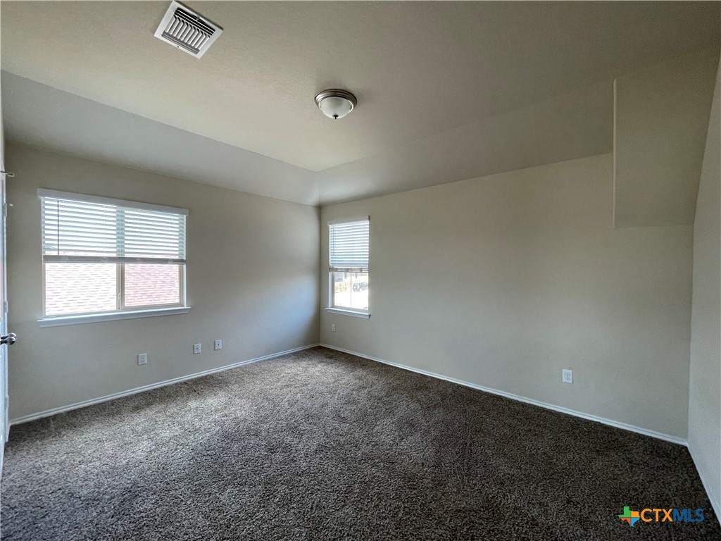 6416 Treiber Drive Temple, TX 76502 - Photo 13 of 19 an empty room with windows