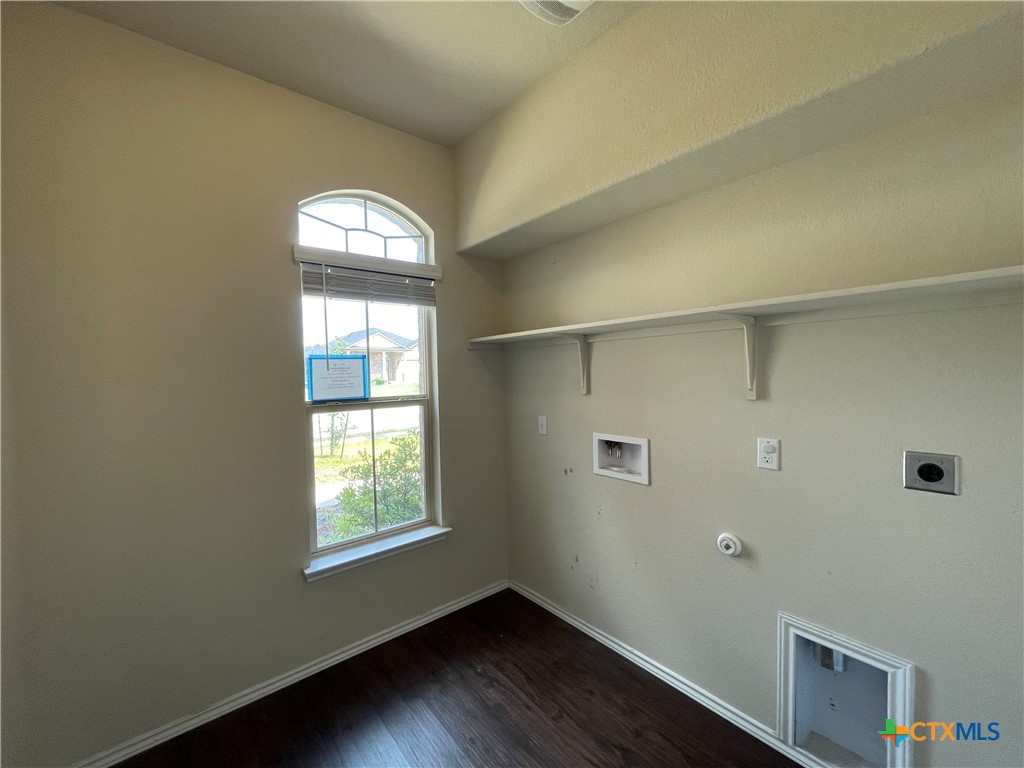 6416 Treiber Drive Temple, TX 76502 - Photo 16 of 19 a view of empty room with wooden floor and fan
