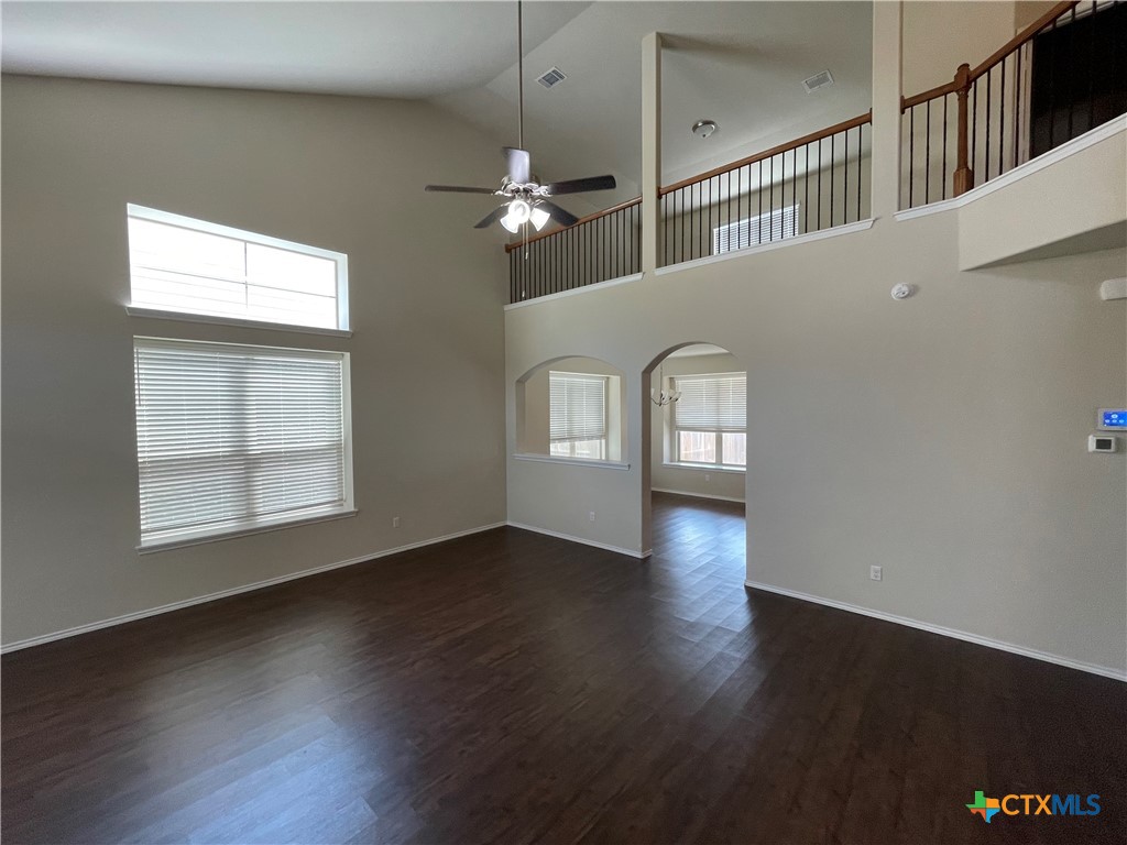 6416 Treiber Drive Temple, TX 76502 - Photo 3 of 19 a view of an empty room with wooden floor and a window