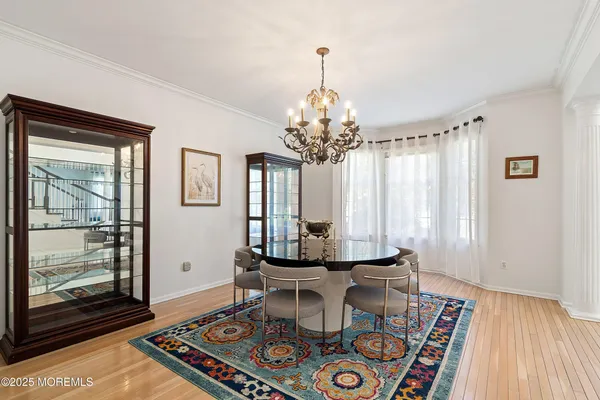 a living room with fireplace and a table