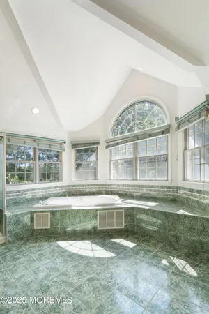 a view of a large building with a swimming pool