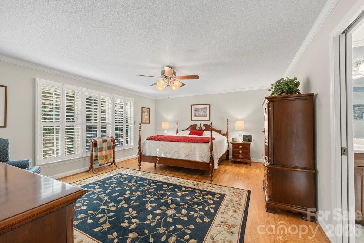 207 Lost Corner Road Morganton, NC 28655 - Photo 30 of 46 a bedroom with bed and wooden floor