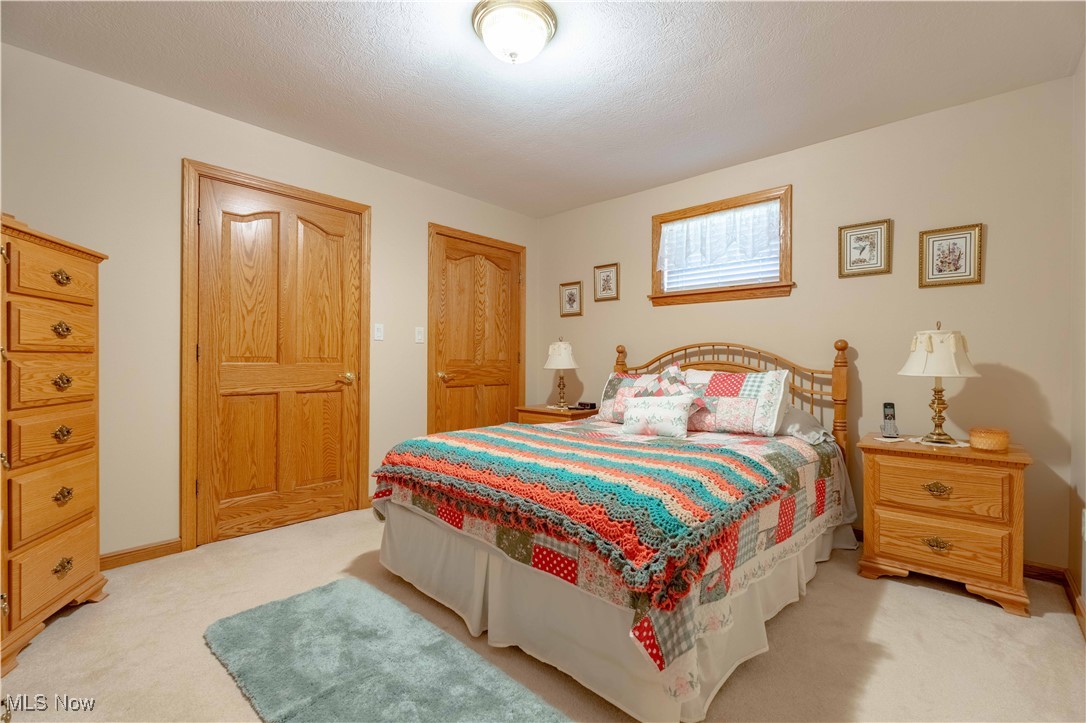 90480 Kilgore Ridge Road Scio, OH 43988 - Photo 18 of 39 Carpeted bedroom with baseboards and a textured ceiling