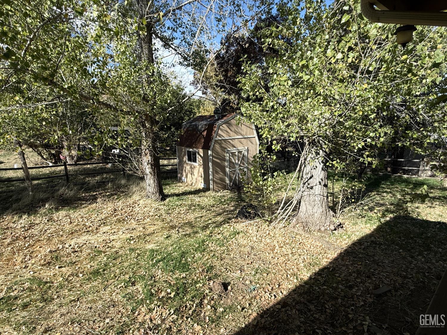 Undisclosed Address Tehachapi, CA 93561 - Photo 15 of 17 a view of a yard with large tree