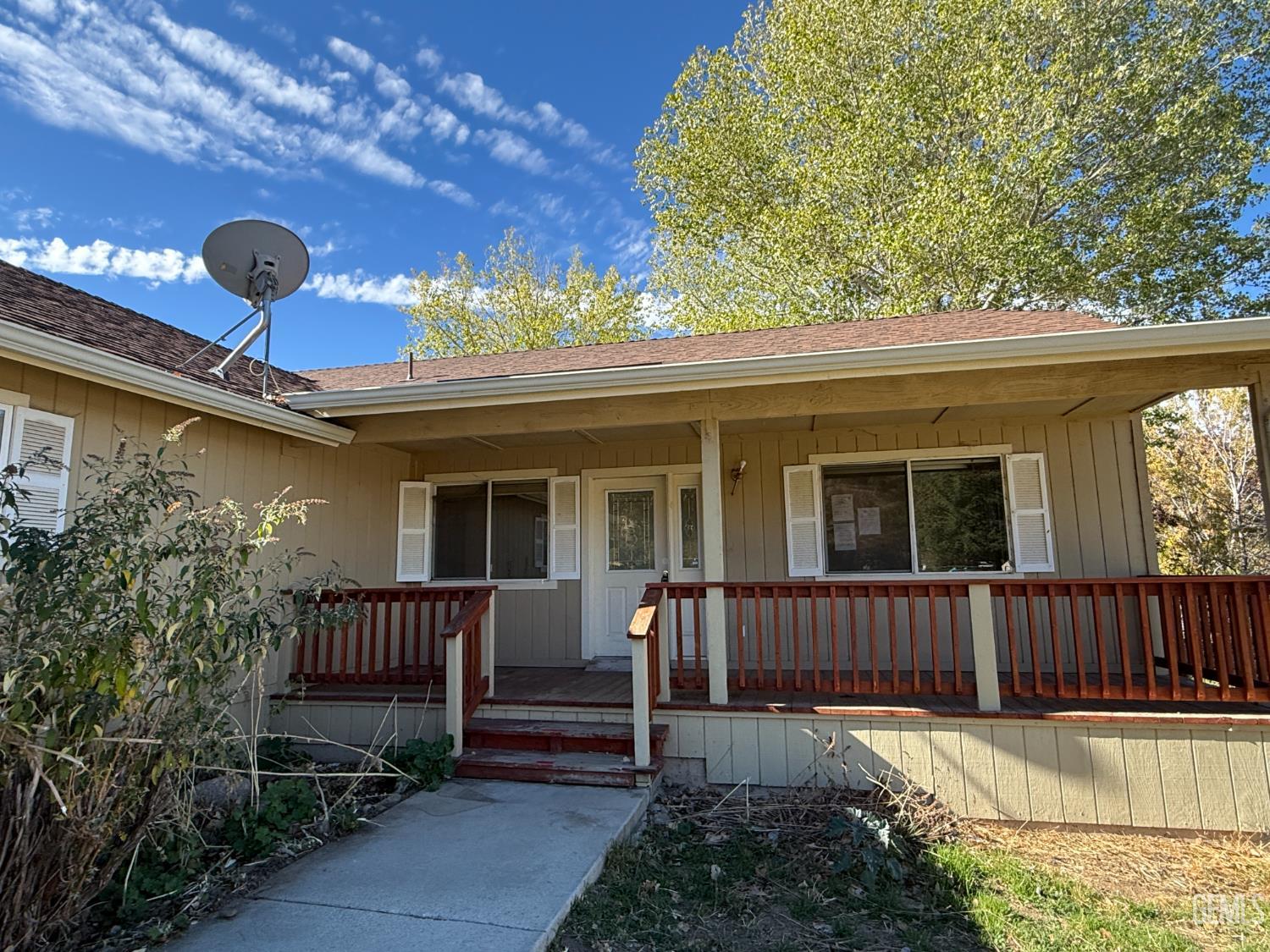 Undisclosed Address Tehachapi, CA 93561 - Photo 2 of 17 a view of a house with a porch and furniture